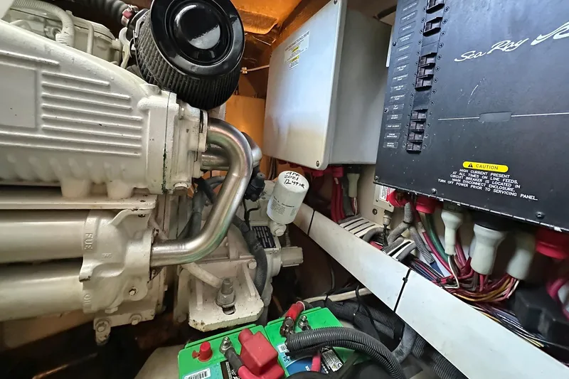 Slide: The Image of Engine room of 2008 Sea Ray 48 Sundancer with technical components. - 37