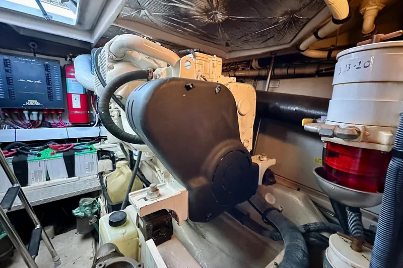 Slide: The Image of Engine room of 2008 Sea Ray 48 Sundancer with technical components. - 38