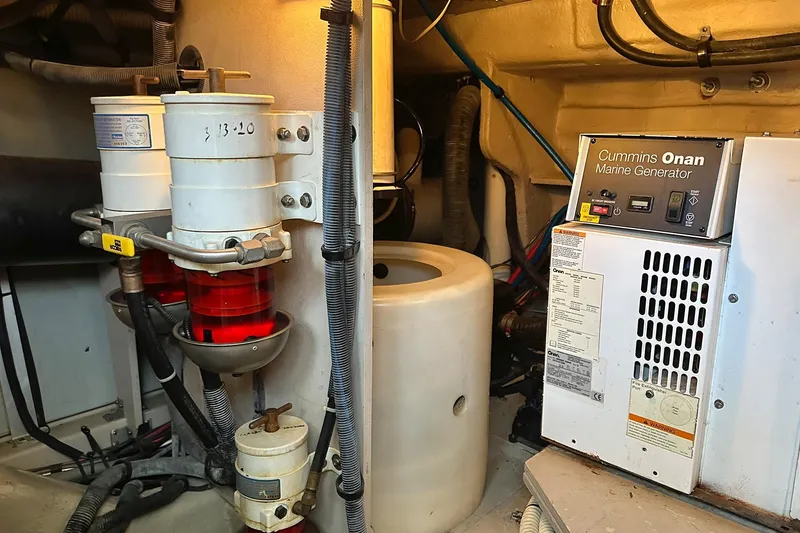 Slide: The Image of Engine room of 2008 Sea Ray 48 Sundancer with Cummins Onan generator. - 40
