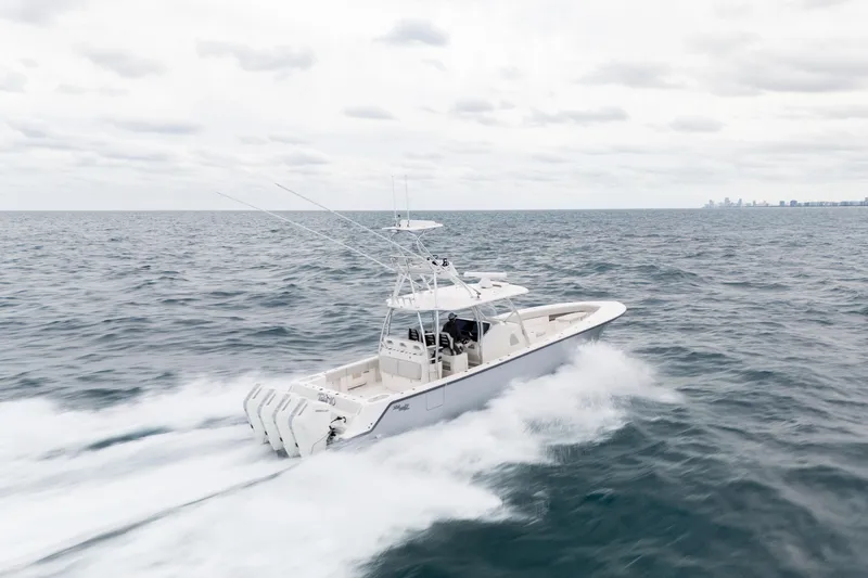 Slide: The Image of 2026 SeaVee 420Z boat cruising on open ocean waters. - 11