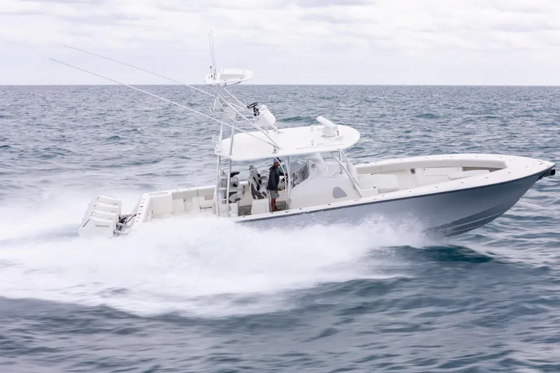 Slide: The Image of 2026 SeaVee 420Z boat cruising on open ocean waters. - 13