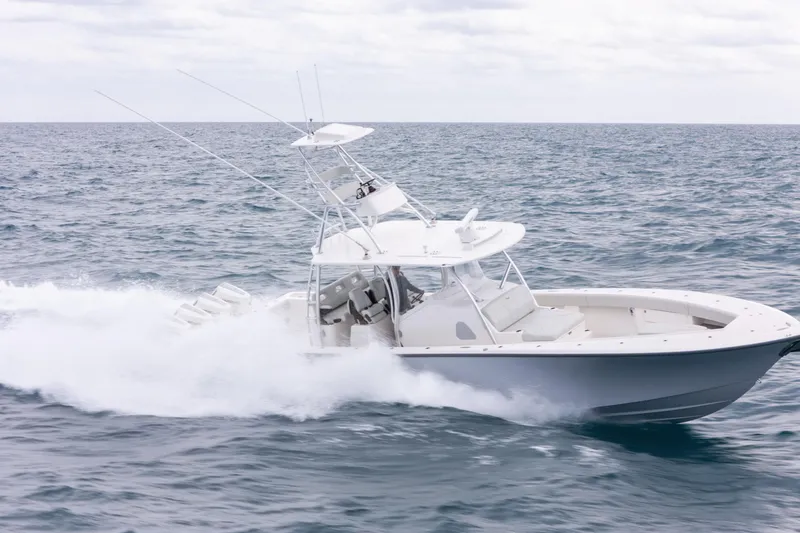 Slide: The Image of 2026 SeaVee 420Z boat cruising on open ocean waters. - 14