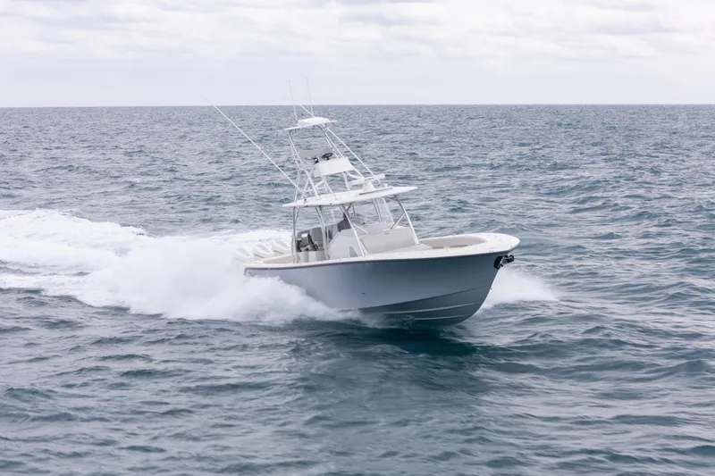 Slide: The Image of 2026 SeaVee 420Z boat cruising on open ocean waters. - 15