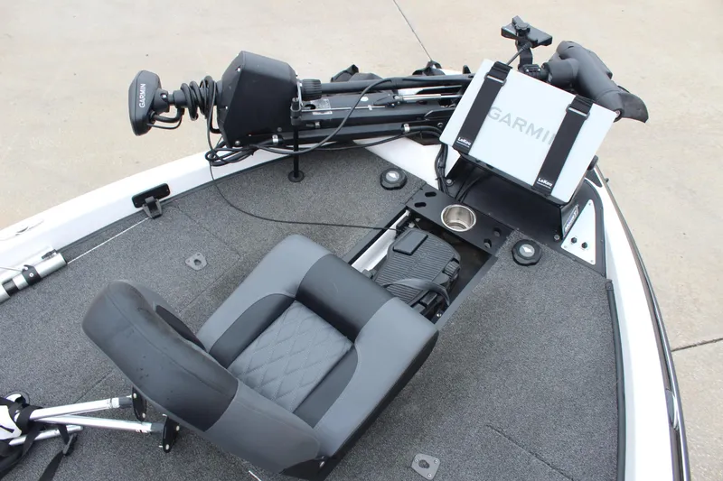 Slide: The Image of 2021 Caymas CX 18 SS boat deck with Garmin system and comfortable seating. - 14