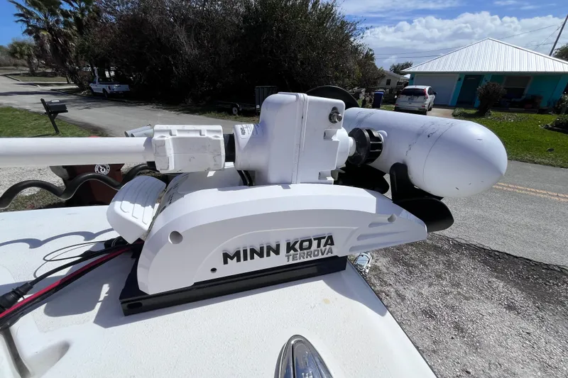 Slide: The Image of Minn Kota Terrova trolling motor on 2016 Crevalle 26 Bay boat, parked outdoors. - 20