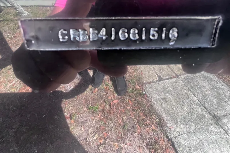 Slide: The Image of 2016 Crevalle 26 Bay boat identification number plate, CRBB41681516, close-up view. - 47