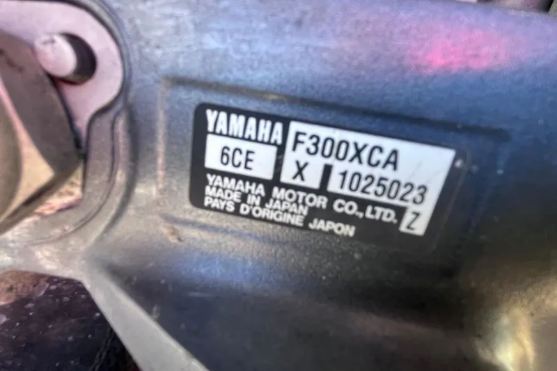 Slide: The Image of Yamaha F300XCA engine label on 2016 Crevalle 26 Bay boat, made in Japan. - 48