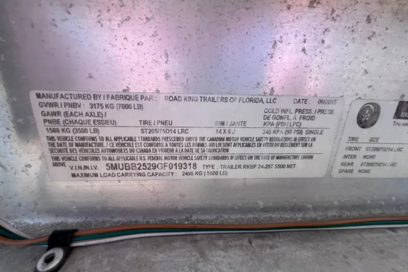 Slide: The Image of Label on Road King trailer, detailing specifications and compliance, dated 06/2015. - 49