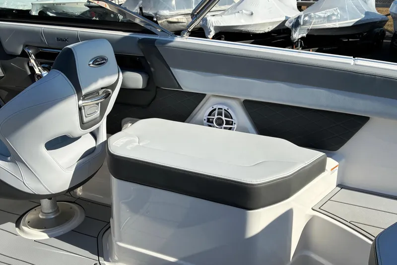 Slide: The Image of 2025 Chaparral 267 SSX boat interior with sleek seating and modern design. - 13