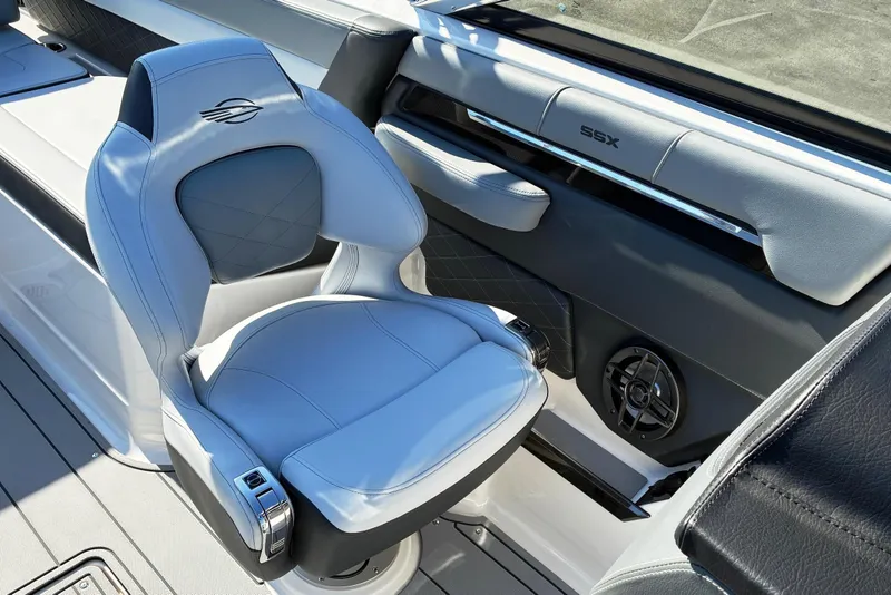 Slide: The Image of 2025 Chaparral 267 SSX boat interior with luxurious seating and modern design. - 14