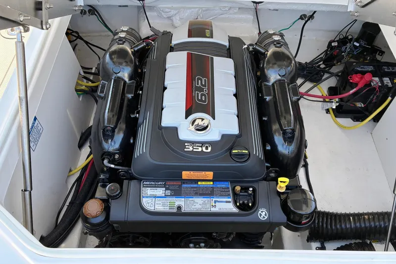 Slide: The Image of 2025 Chaparral 267 SSX boat engine compartment with 6.2L Mercury 350 engine. - 21