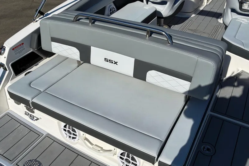Slide: The Image of 2025 Chaparral 267 SSX boat interior with gray seating and SSX logo. - 6