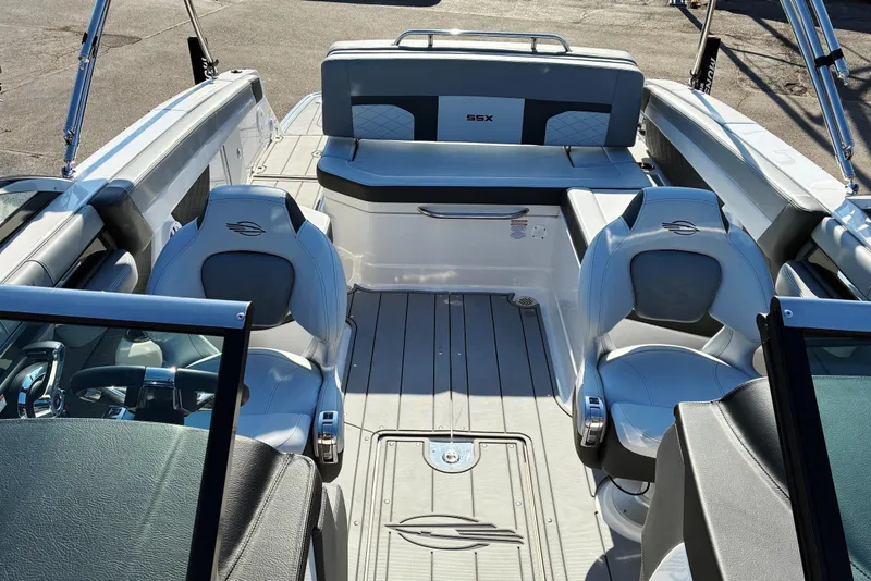 Slide: The Image of 2025 Chaparral 267 SSX boat interior with luxurious seating and modern design. - 8