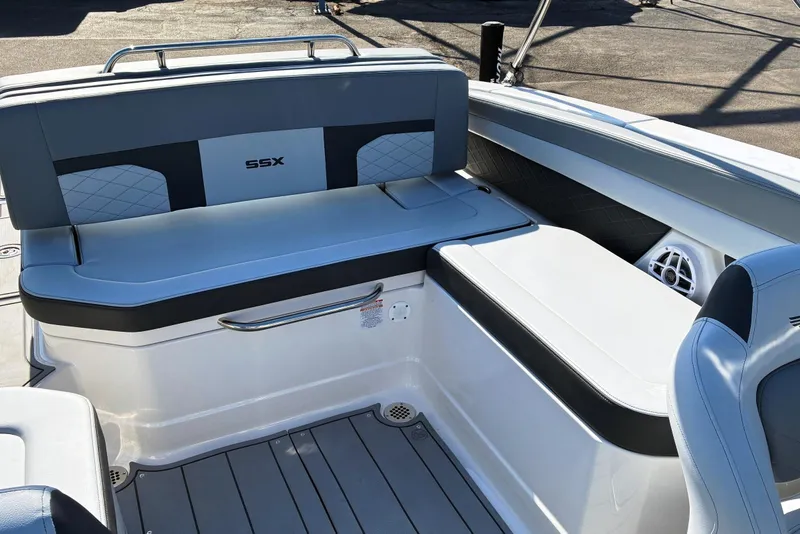 Slide: The Image of 2025 Chaparral 267 SSX boat interior with stylish seating and modern design. - 9