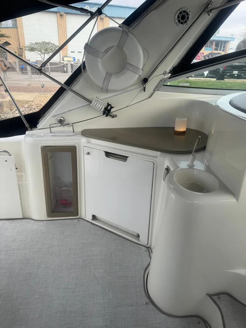 Slide: The Image of Interior of a 1998 Cruisers Yachts 3870 Espirit with fridge and sink. - 10