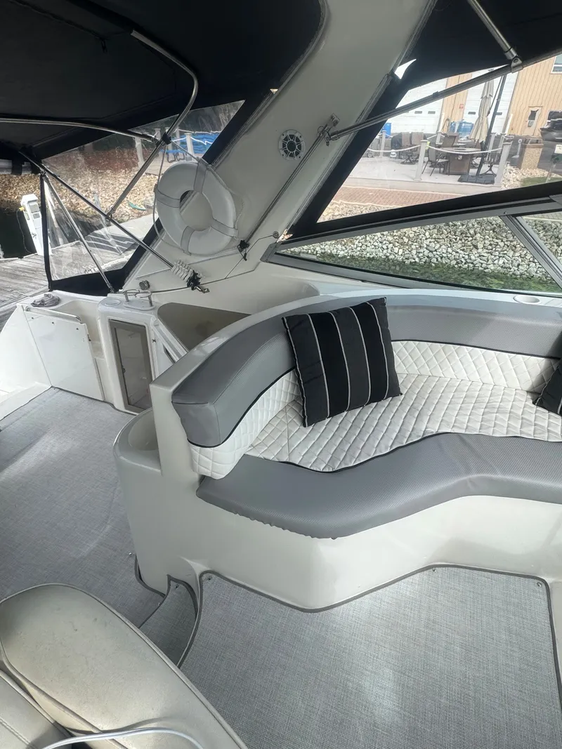 Slide: The Image of Interior of a 1998 Cruisers Yachts 3870 Espirit with gray upholstery. - 13