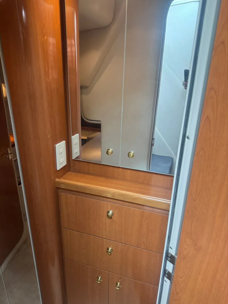 Slide: The Image of Interior of 1998 Cruisers Yachts 3870 Espirit with wooden cabinets. - 22