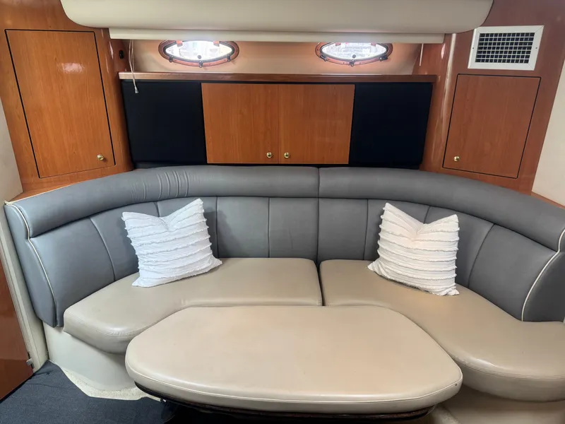 Slide: The Image of Interior of 1998 Cruisers Yachts 3870 Espirit with gray sofa. - 28