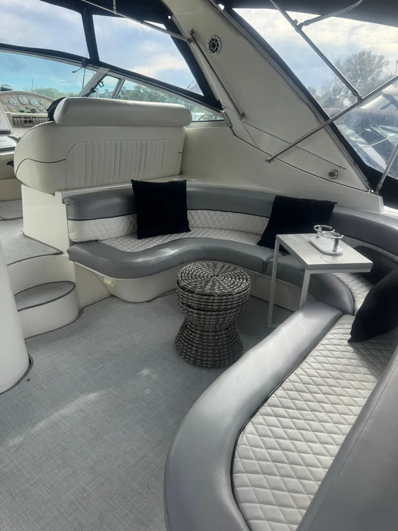 Slide: The Image of Interior of 1998 Cruisers Yachts 3870 Espirit with elegant seating area. - 6