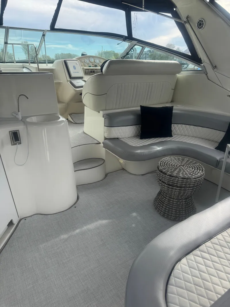Slide: The Image of Interior of a 1998 Cruisers Yachts 3870 Espirit with elegant seating arrangement. - 8