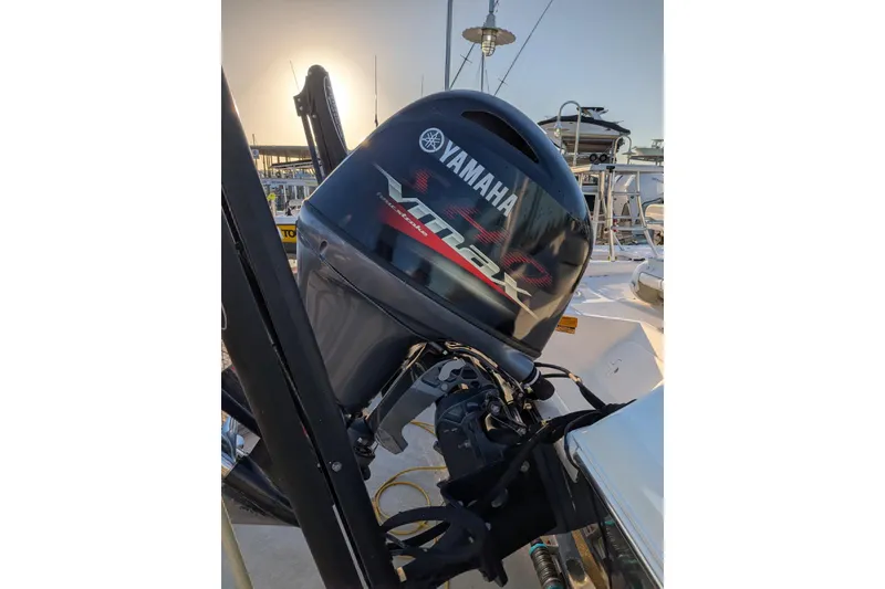 Slide: The Image of 2017 Skeeter SX200 with Yamaha VMAX outboard motor at marina. - 4