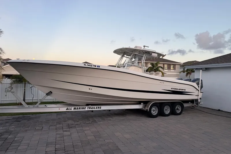 Slide: The Image of 2006 Hydra-Sports Vector 3300 CC boat on trailer in residential driveway. - 4