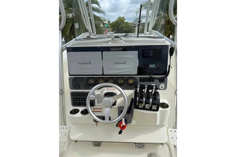 Slide: The Image of 2006 Hydra-Sports Vector 3300 CC helm with Garmin navigation system and controls. - 6