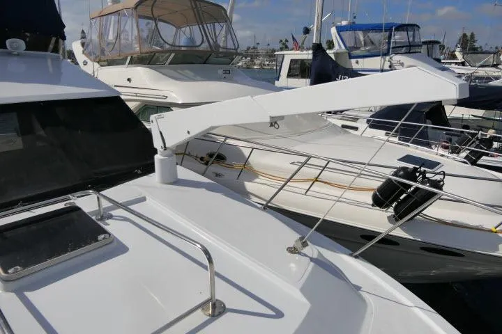 Slide: The Image of 1986 Ocean Alexander 39 Sedan yacht docked, featuring sleek design and modern amenities. - 57