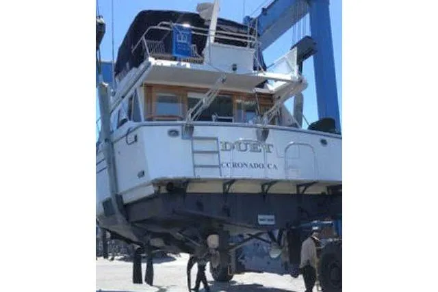 Slide: The Image of 1986 Ocean Alexander 39 Sedan yacht in dry dock for maintenance. - 77
