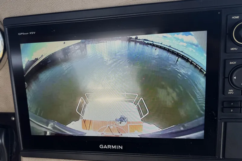 Slide: The Image of Garmin GPS display on 1999 Silverton 422 Motor Yacht showing rear view of water and dock. - 11