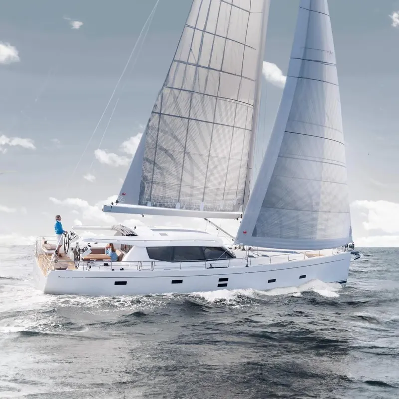 The Image of 2016 Moody Decksaloon 54 sailing yacht on open sea with full sails. - 0