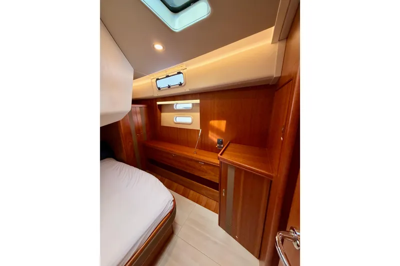 Slide: The Image of Luxurious wooden interior of 2016 Moody Decksaloon 54 yacht cabin. - 100