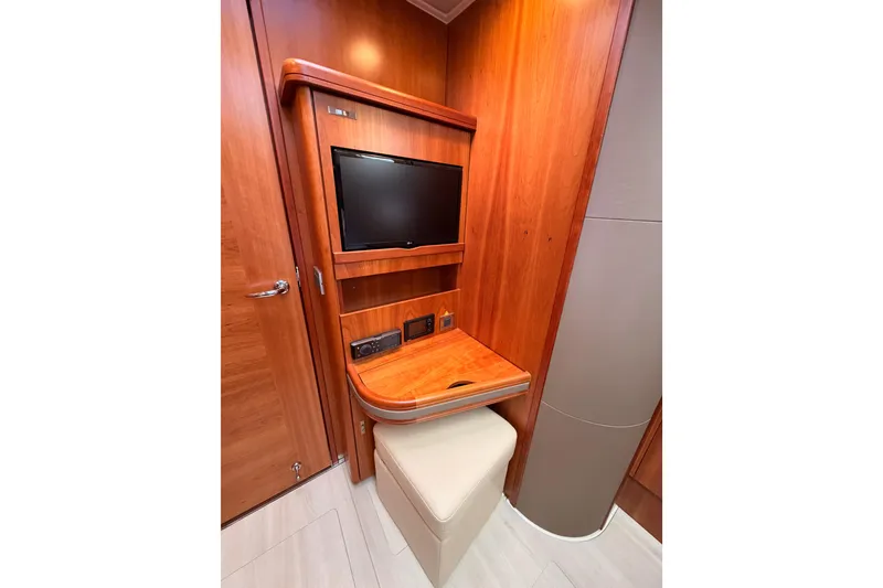 Slide: The Image of Luxurious Moody Decksaloon 54 yacht interior with TV and wooden desk, 2016 model. - 114