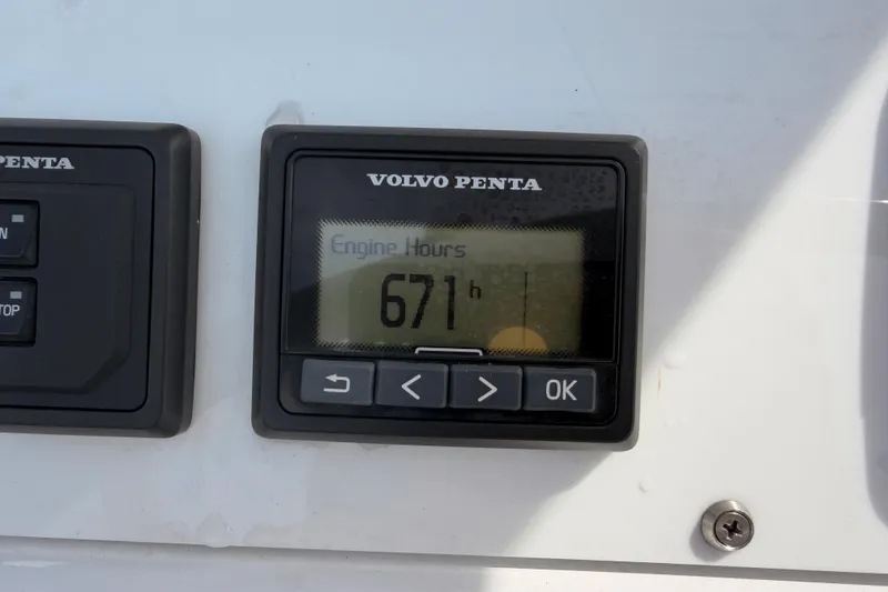 Slide: The Image of Volvo Penta engine hour meter showing 671 hours on a 2016 Moody Decksaloon 54. - 130