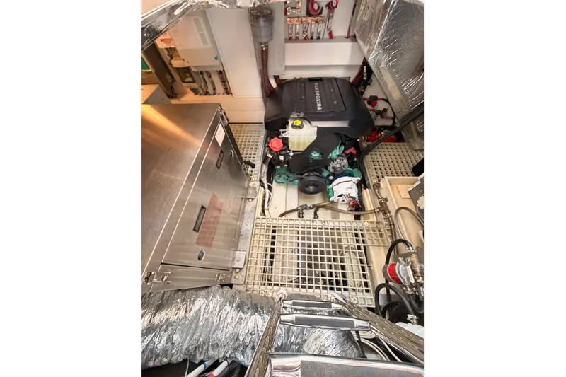 Slide: The Image of Engine room of 2016 Moody Decksaloon 54 yacht, featuring Volvo Penta engine and equipment. - 131