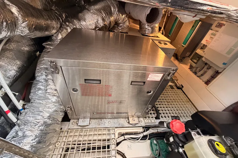 Slide: The Image of Engine room of 2016 Moody Decksaloon 54 yacht with metal equipment and insulation. - 134