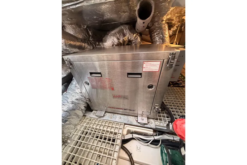 Slide: The Image of Engine room of 2016 Moody Decksaloon 54 yacht with machinery and ductwork. - 135