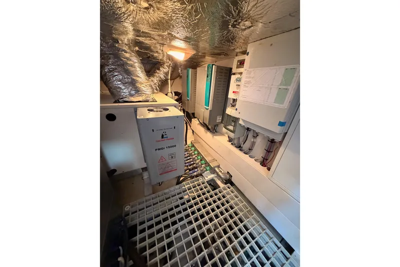 Slide: The Image of Engine room of 2016 Moody Decksaloon 54 yacht with electrical panels and equipment. - 136