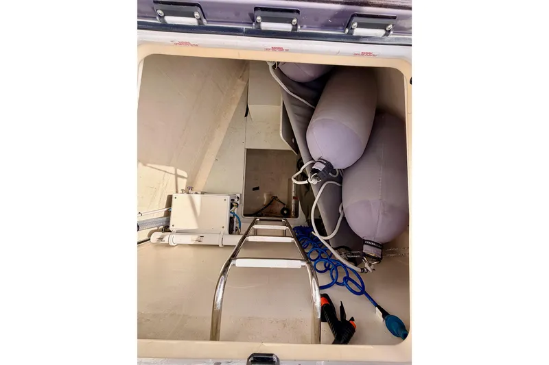 Slide: The Image of Storage compartment of 2016 Moody Decksaloon 54 yacht with equipment and fenders. - 22
