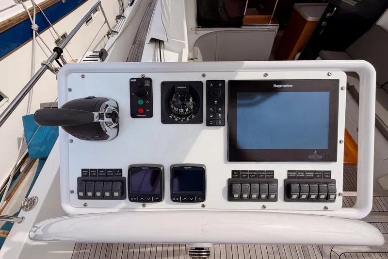 Slide: The Image of Control panel of 2016 Moody Decksaloon 54 yacht with navigation instruments. - 40