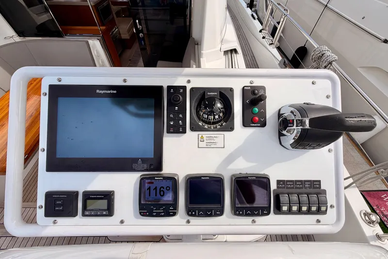 Slide: The Image of Control panel of a 2016 Moody Decksaloon 54 yacht with navigation instruments. - 42