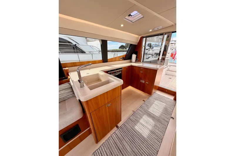 Slide: The Image of Luxurious interior of 2016 Moody Decksaloon 54 yacht with modern kitchen design. - 55