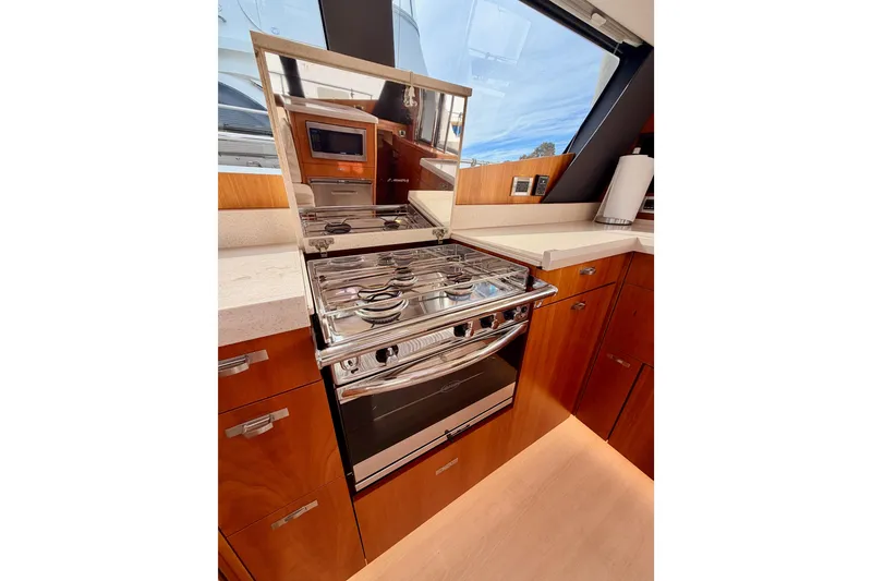Slide: The Image of Modern kitchen in 2016 Moody Decksaloon 54 yacht with stove and microwave. - 57