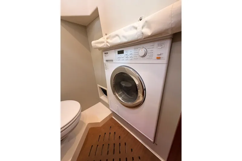 Slide: The Image of Laundry area with washing machine in 2016 Moody Decksaloon 54 yacht. - 67