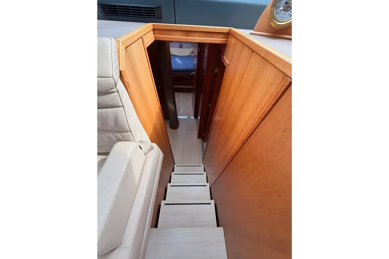 Slide: The Image of Staircase leading to cabin interior of 2016 Moody Decksaloon 54 yacht. - 84