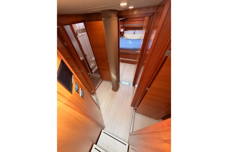 Slide: The Image of Luxurious interior of 2016 Moody Decksaloon 54 yacht with wood finish and cozy cabin. - 85