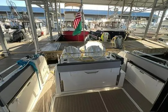 Slide: The Image of 2024 Jeanneau NC 895 Sport bathroom with modern fixtures and compact design. - 16