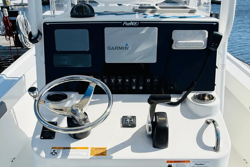 Slide: The Image of Center console of 2018 Parker 23SE boat with Garmin navigation system. - 4