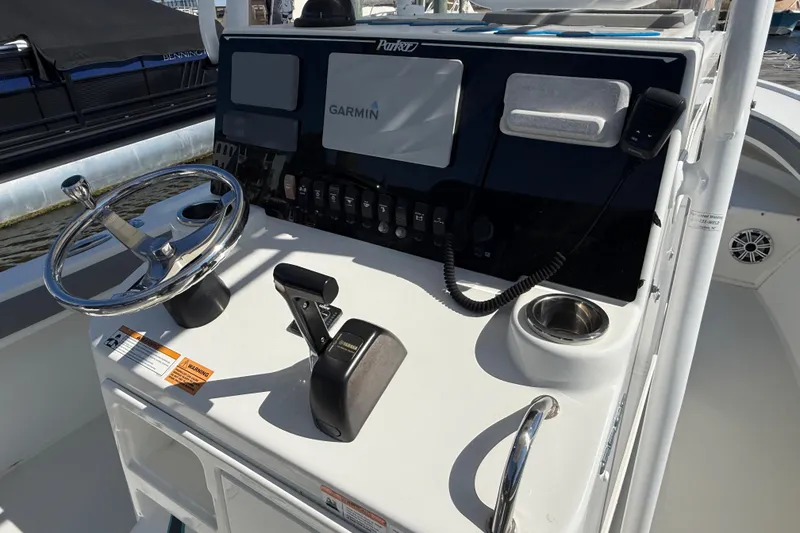 Slide: The Image of 2018 Parker 23SE Center Console boat dashboard with Garmin navigation system. - 7