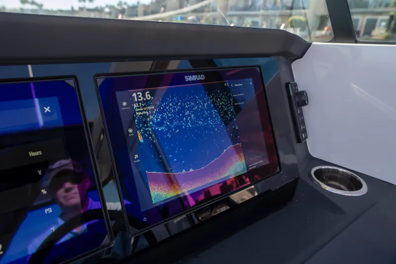 Slide: The Image of Simrad display on 2024 Axopar 29 XC Cross Cabin boat dashboard. - 23